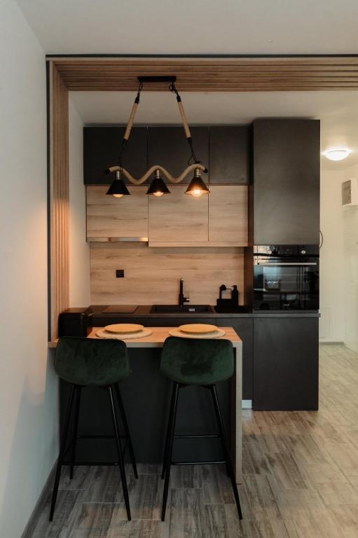 Cucina o angolo cottura di Apartman Resident