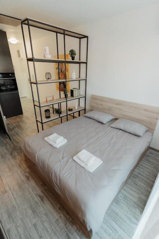Letto o letti in una camera di Apartman Resident