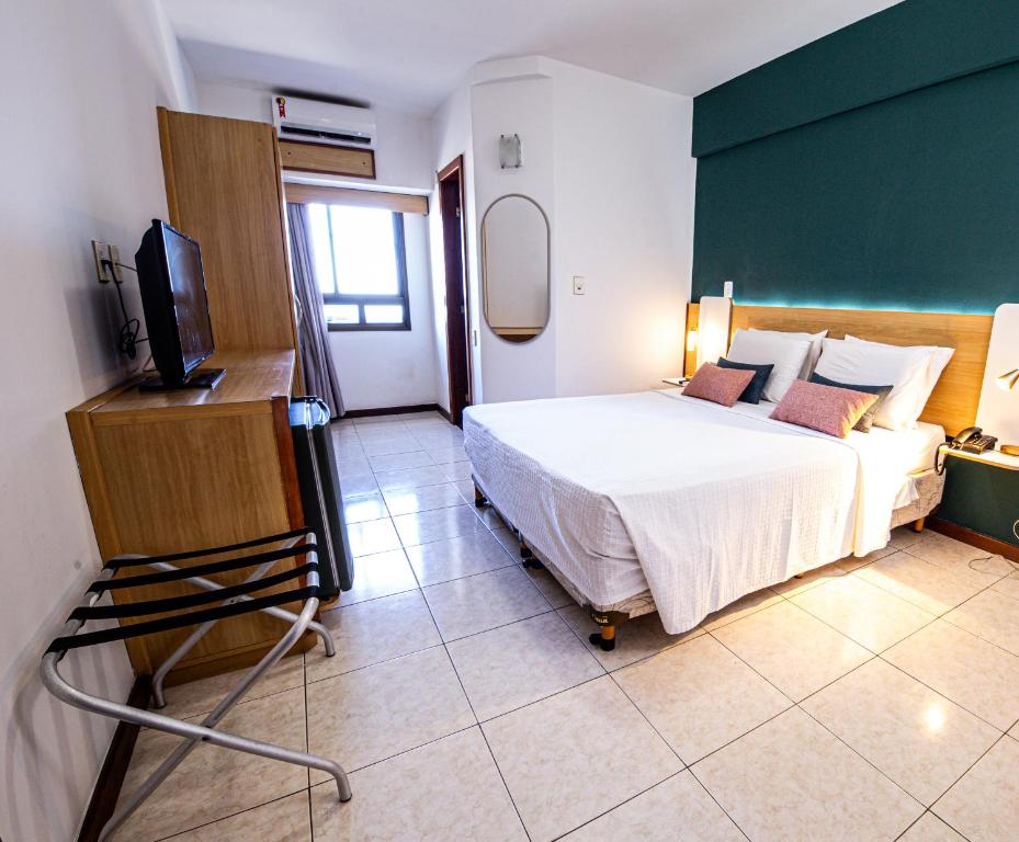 Postel nebo postele na pokoji v ubytování Hotel Verdemar