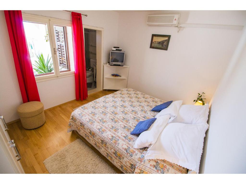Postel nebo postele na pokoji v ubytování Bol Residence