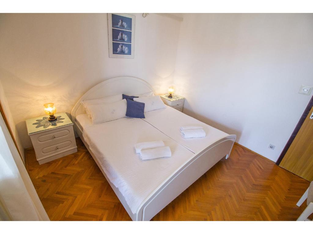 Postel nebo postele na pokoji v ubytování Bol Residence