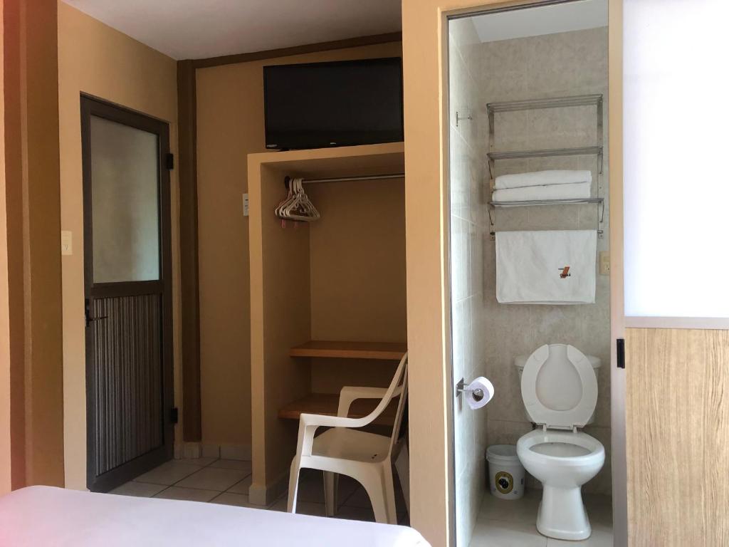 Koupelna v ubytování Hotel Catala