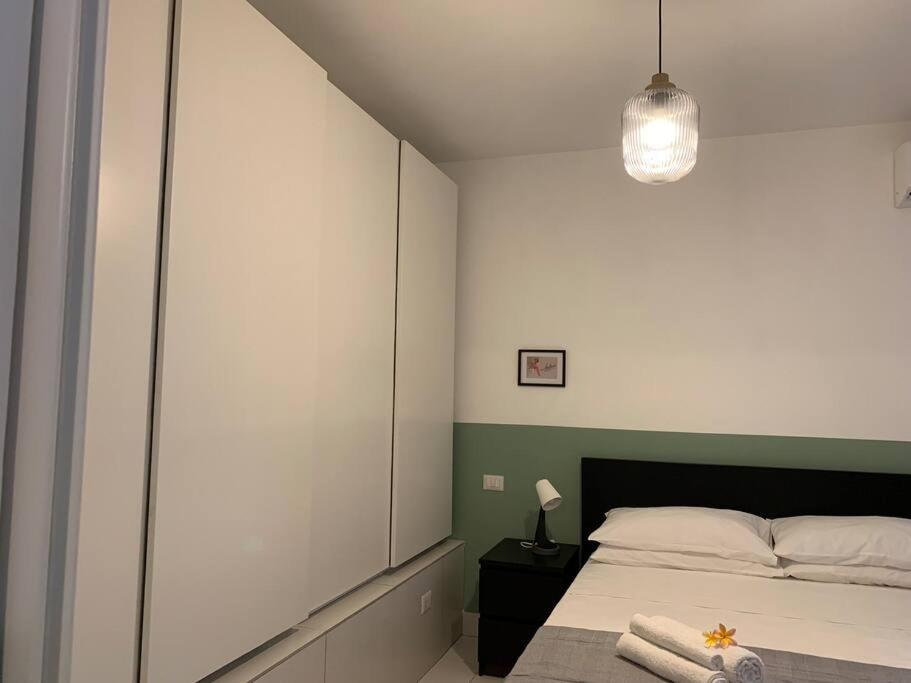 Postel nebo postele na pokoji v ubytování "CITY CENTER 10Stars"- Casetta Matteotti- Feel like HOME