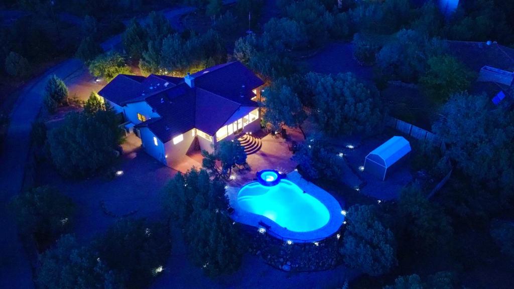an aerial view of a house with a swimming pool at Sedona's Paradise Found, Saltwater Pool and Hot Tub, Private Oasis! in Sedona