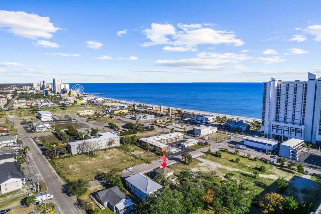 an aerial view of a city and the ocean at Dazzling Centrally Located Ocean View w Huge Private Yard, 2 Decks, Firepit, BBQ in Myrtle Beach