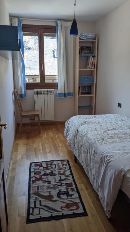 Postel nebo postele na pokoji v ubytování Jarandín 27 - Adosado familiar en Biescas