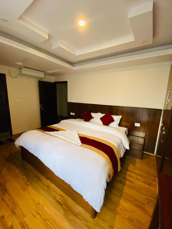 Postel nebo postele na pokoji v ubytování Hotel Abi International