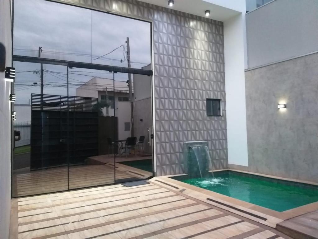 Swimmingpoolen hos eller tæt på Residência Cidade Verde 3