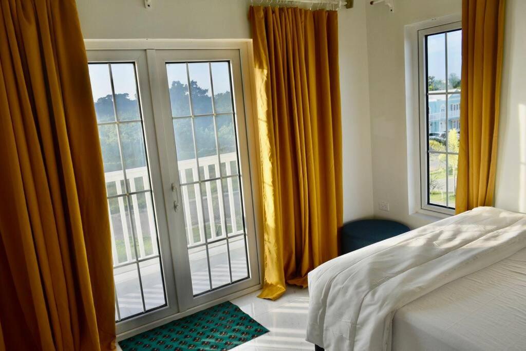 Postel nebo postele na pokoji v ubytování Irie Vibes Ocean View
