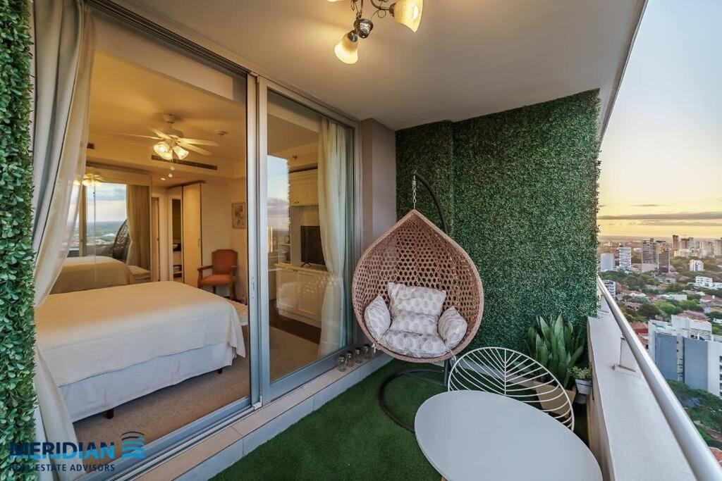 Voodi või voodid majutusasutuse Gorgeous Apartment in Asunción toas