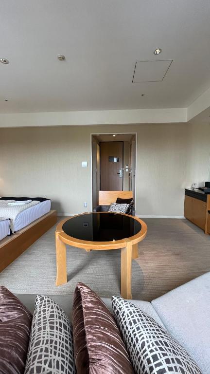 Postel nebo postele na pokoji v ubytování KOKO HOTEL Premier Kanazawa Korinbo