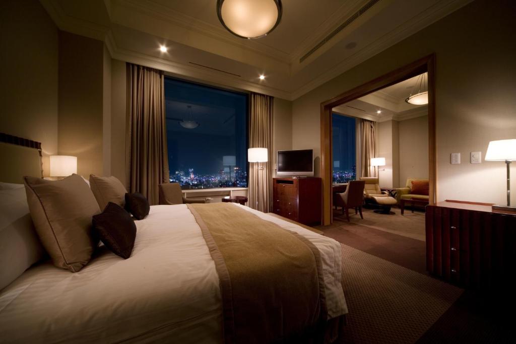 Postel nebo postele na pokoji v ubytování Imperial Hotel Osaka
