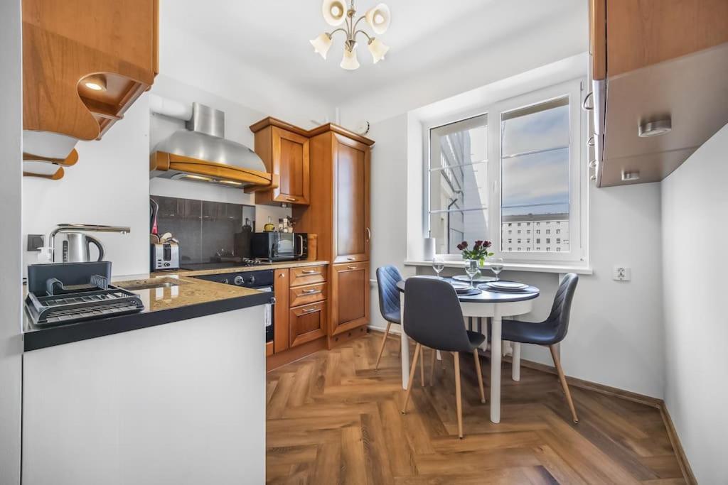 Kuchyň nebo kuchyňský kout v ubytování Cozy apartment in the city center
