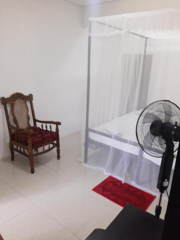 Postel nebo postele na pokoji v ubytování T & U Homestay