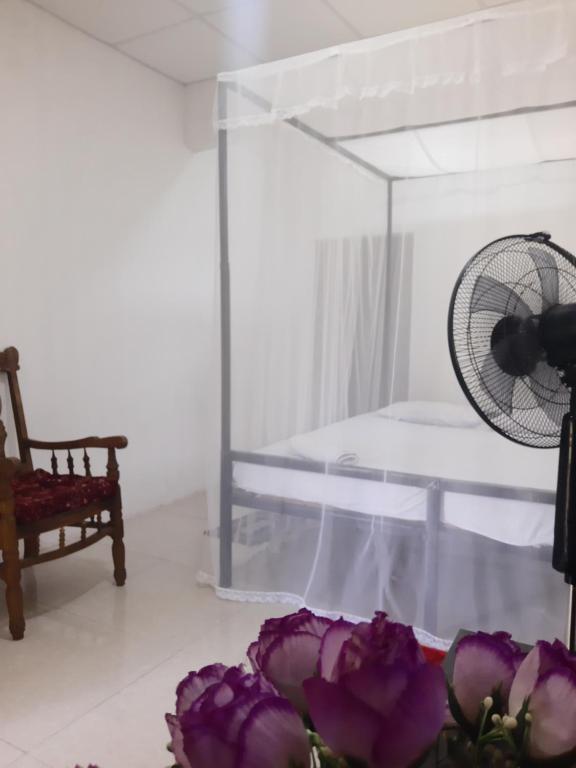 Postel nebo postele na pokoji v ubytování T & U Homestay