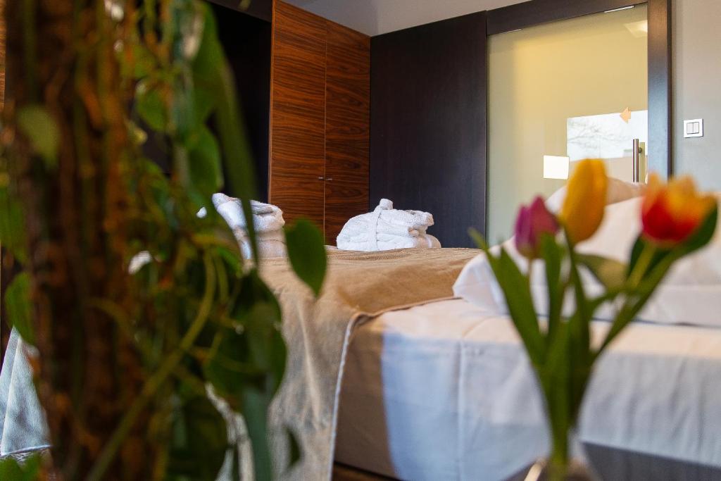 Postel nebo postele na pokoji v ubytování Hotel Avance