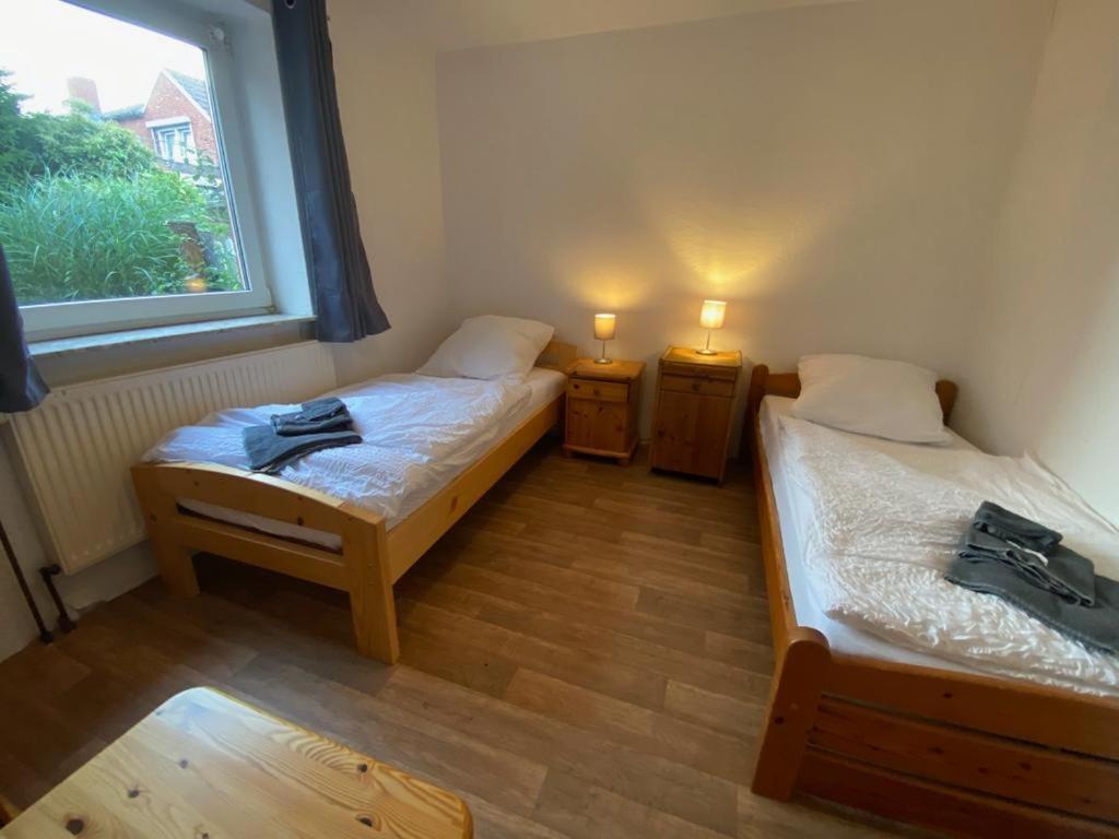 Postel nebo postele na pokoji v ubytování Großes Monteurhaus in Emden