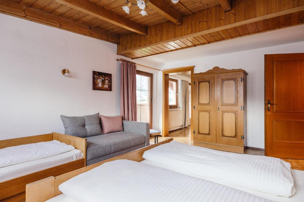 Postel nebo postele na pokoji v ubytování Hotel Andrea