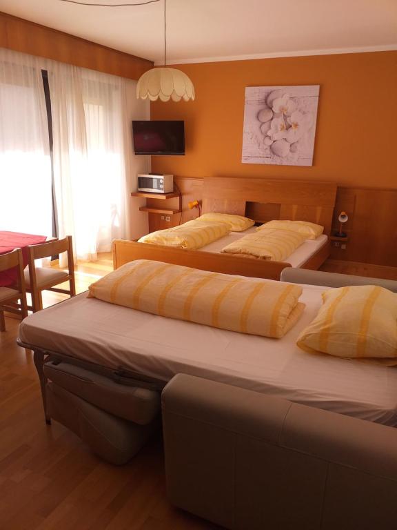 Postel nebo postele na pokoji v ubytování Residence Gerold