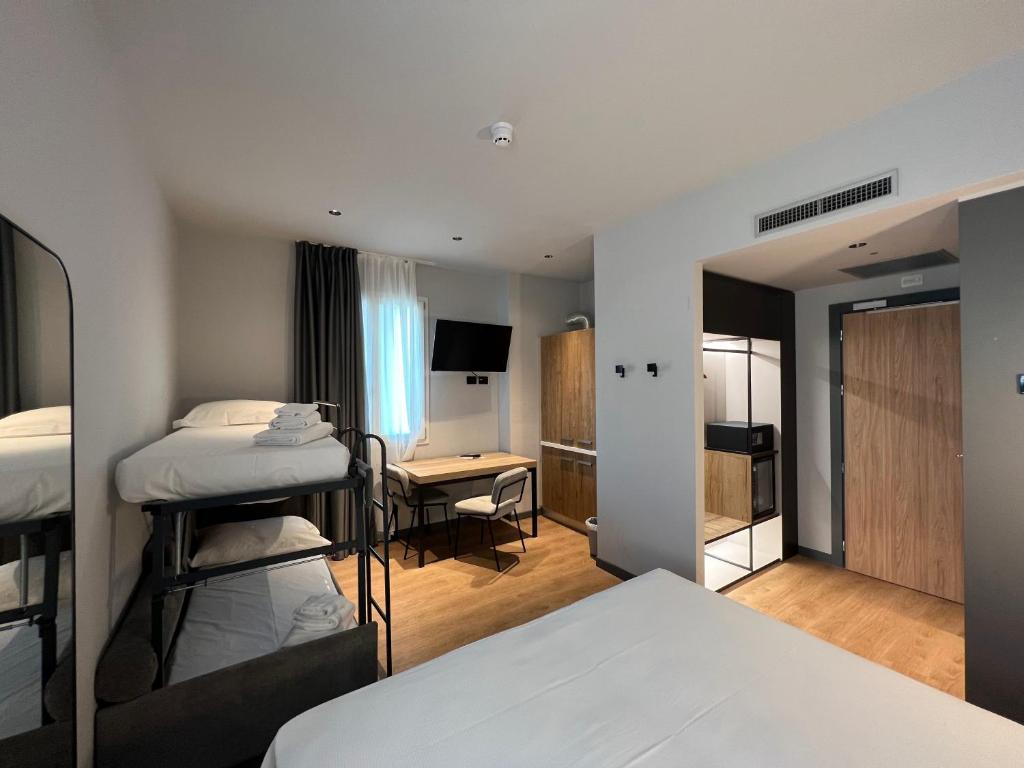Postel nebo postele na pokoji v ubytování Hotel Leonessa