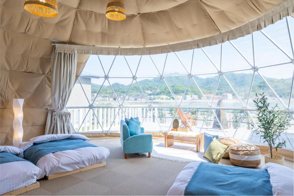 Postel nebo postele na pokoji v ubytování GLAMP VILLAGE SETOUCHI-SHIMANAMI