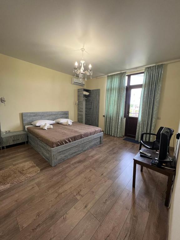 Postel nebo postele na pokoji v ubytování GRAND ANAKLIA - Guest Hotel