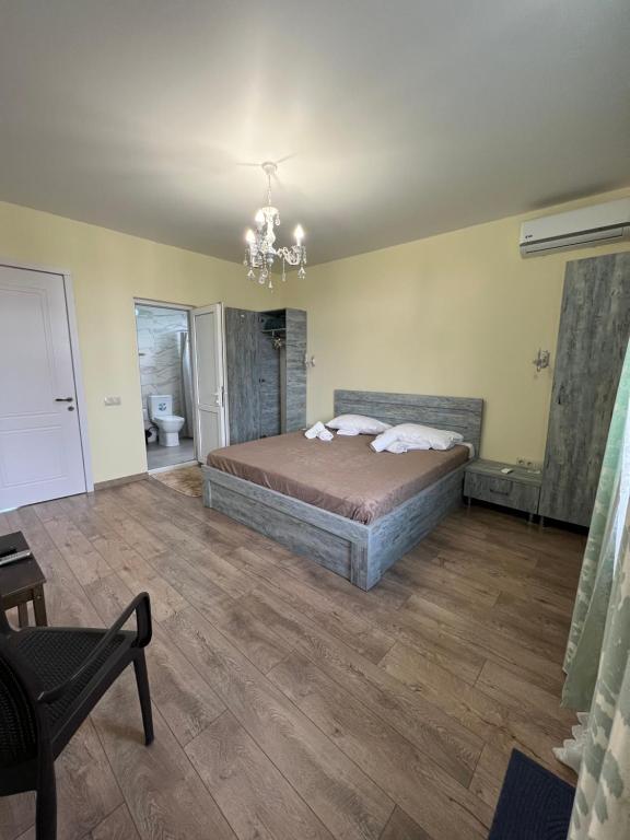 Postel nebo postele na pokoji v ubytování GRAND ANAKLIA - Guest Hotel