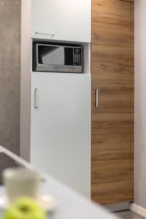 Kuchyňa alebo kuchynka v ubytovaní Apartament 24 AbsyntApart Rynek Wrocław