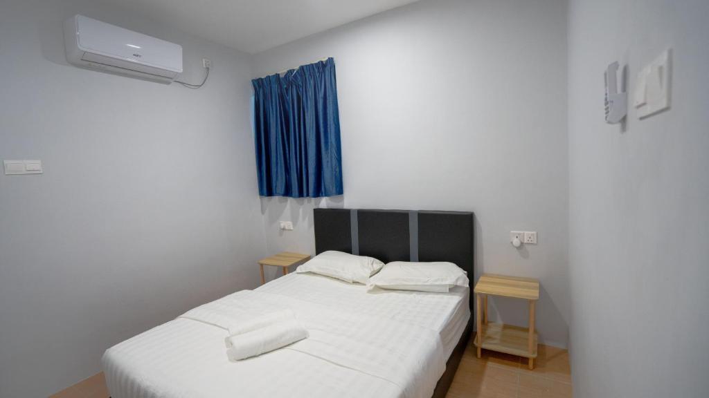 Postel nebo postele na pokoji v ubytování Bubble House Semporna 泡泡屋