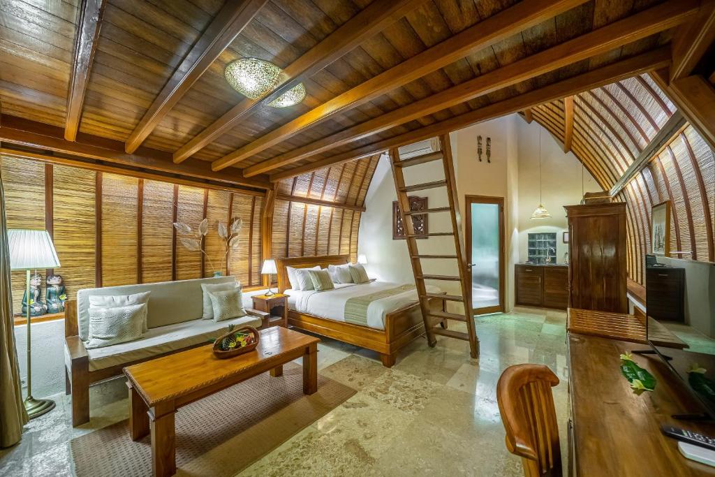 TV a/nebo společenská místnost v ubytování Klumpu Bali Resort