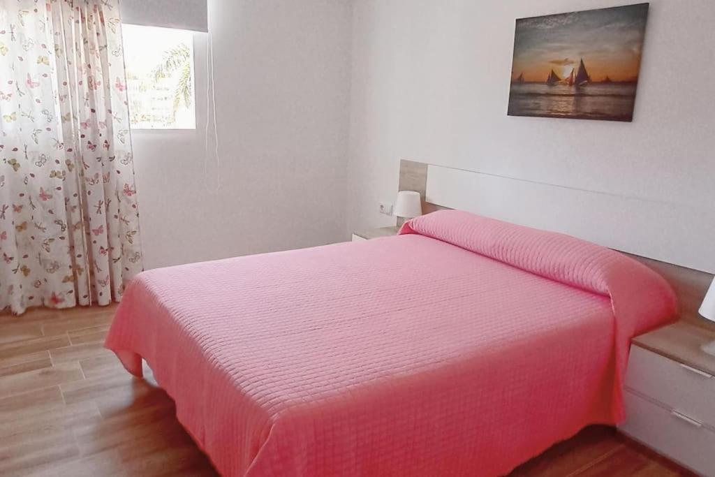 Postel nebo postele na pokoji v ubytování Vivienda Vacacional Rosaini