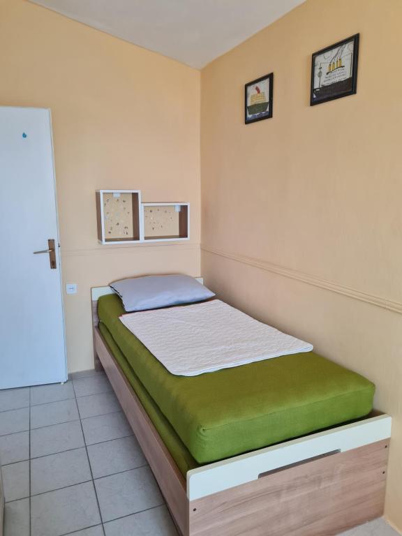 Postel nebo postele na pokoji v ubytování Apartments Ivan