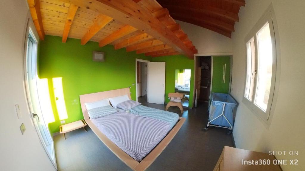 A bed or beds in a room at "Lake & Mountain" Summer House