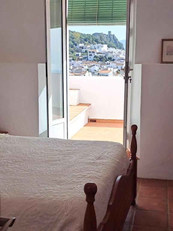 Postel nebo postele na pokoji v ubytování CASA SINCLAIR