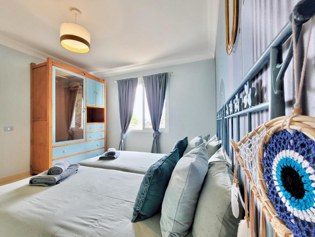 Postel nebo postele na pokoji v ubytování Villa Heaven'a