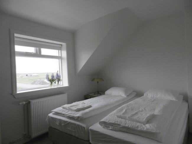 Postel nebo postele na pokoji v ubytování Farmhouse Meiri-Tunga 1