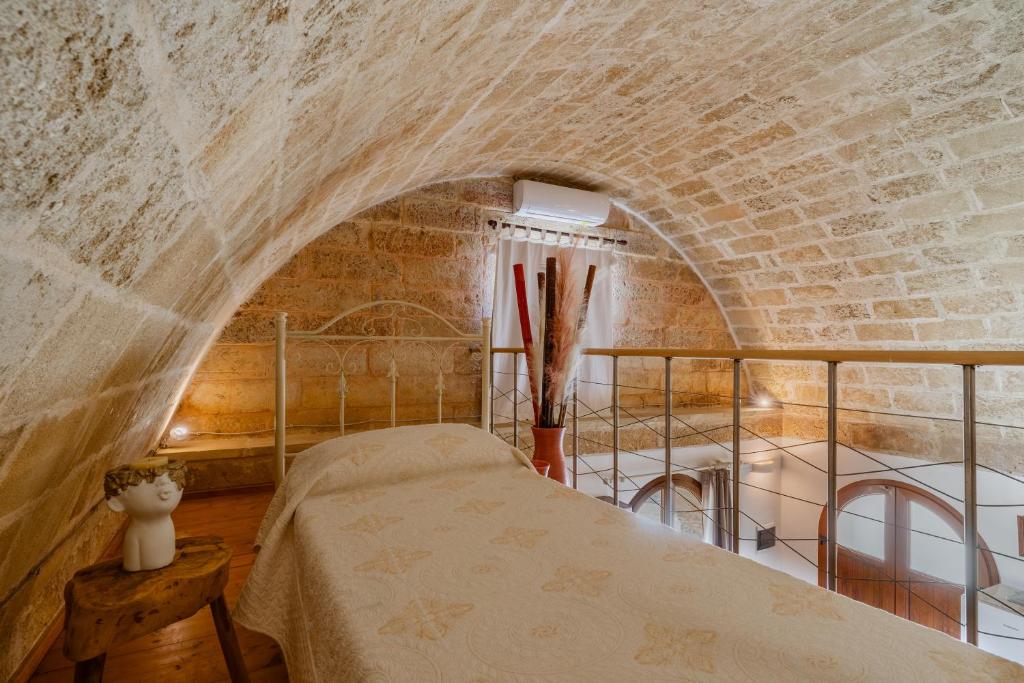 Postel nebo postele na pokoji v ubytování Dimora Soleda
