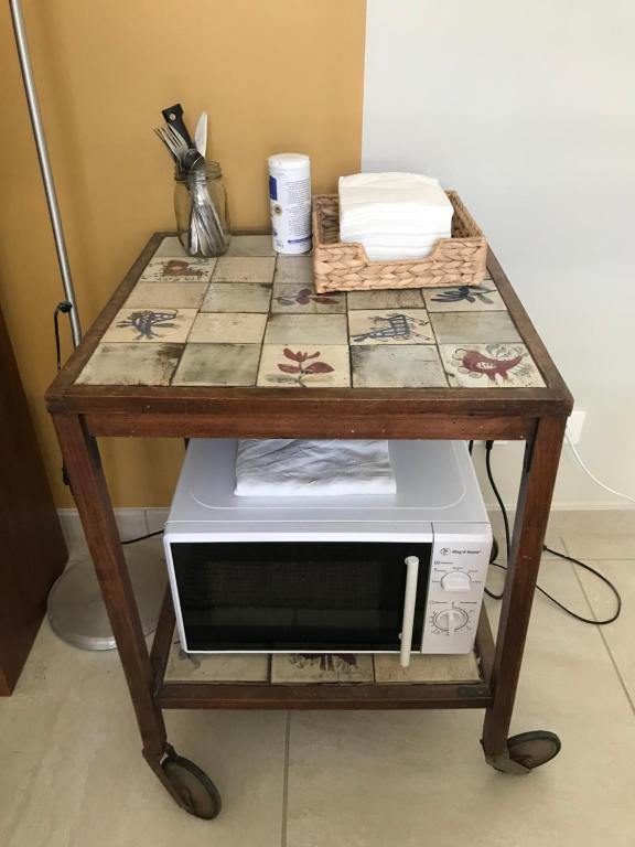 Kuchyň nebo kuchyňský kout v ubytování ferme st pierre 2 suites avec repas, piscine, clim, cheminée ou baignoire spa