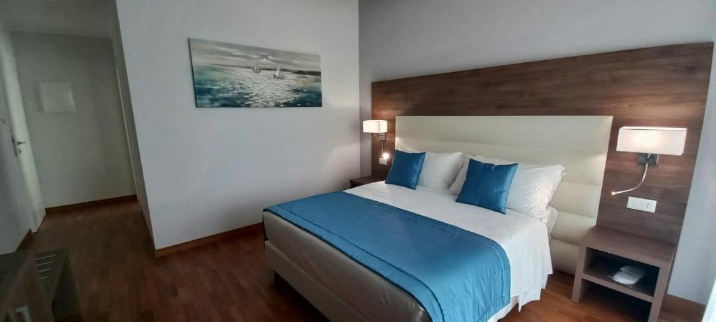 Postel nebo postele na pokoji v ubytování Orchid Luxury Suite