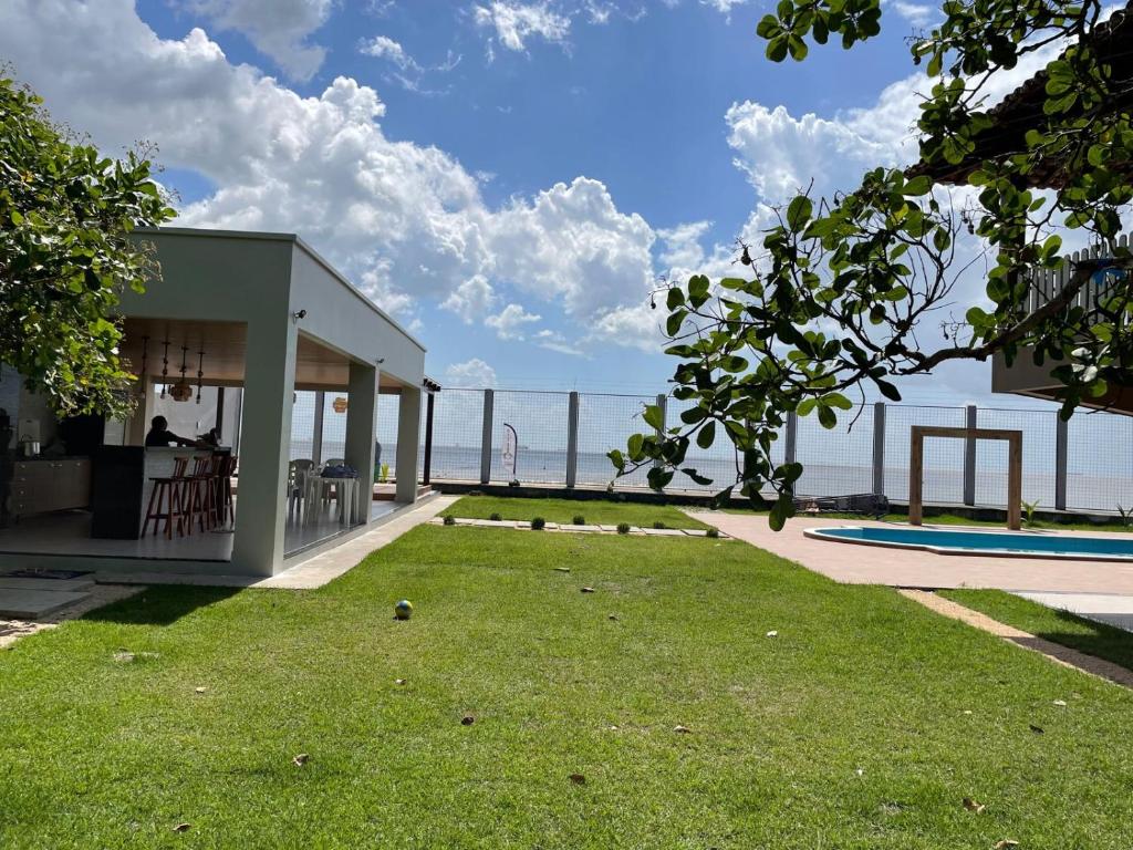 a house with a view of the ocean at Solar Calixto in Belém