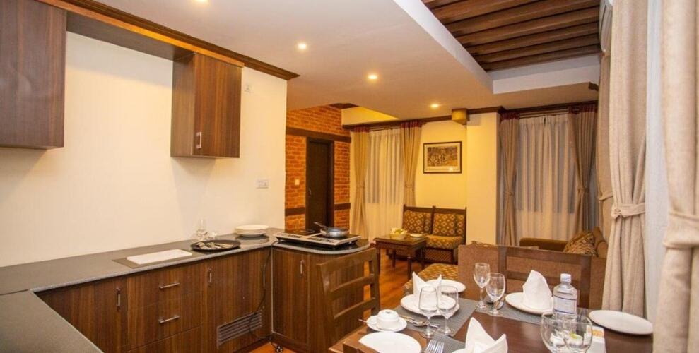 Kuchyň nebo kuchyňský kout v ubytování Pashupati Boutique Hotel & Spa