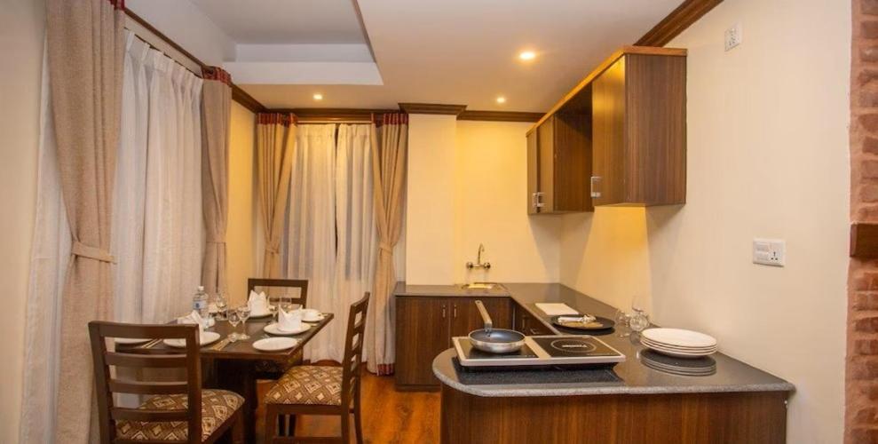 Kuchyň nebo kuchyňský kout v ubytování Pashupati Boutique Hotel & Spa