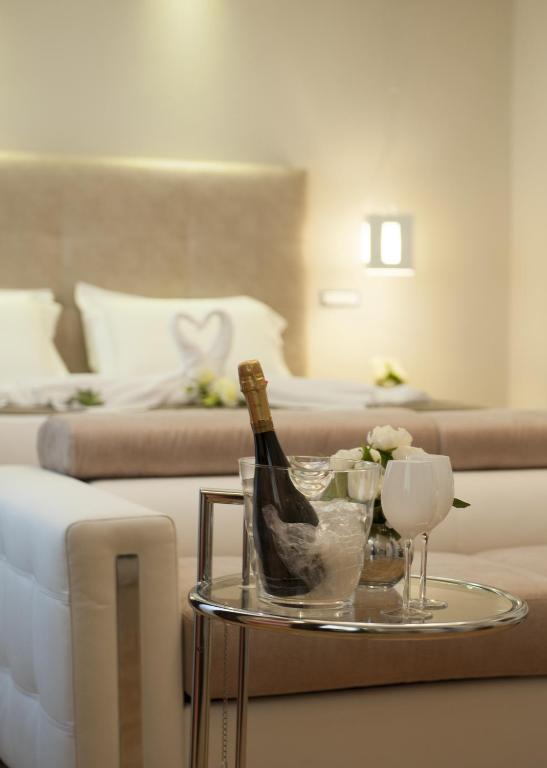 Łóżko lub łóżka w pokoju w obiekcie Terrazza Marco Antonio Luxury Suite