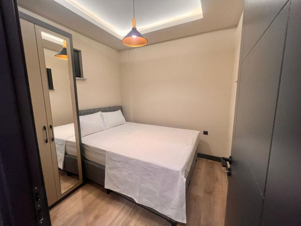 Postel nebo postele na pokoji v ubytování Hayal Fener