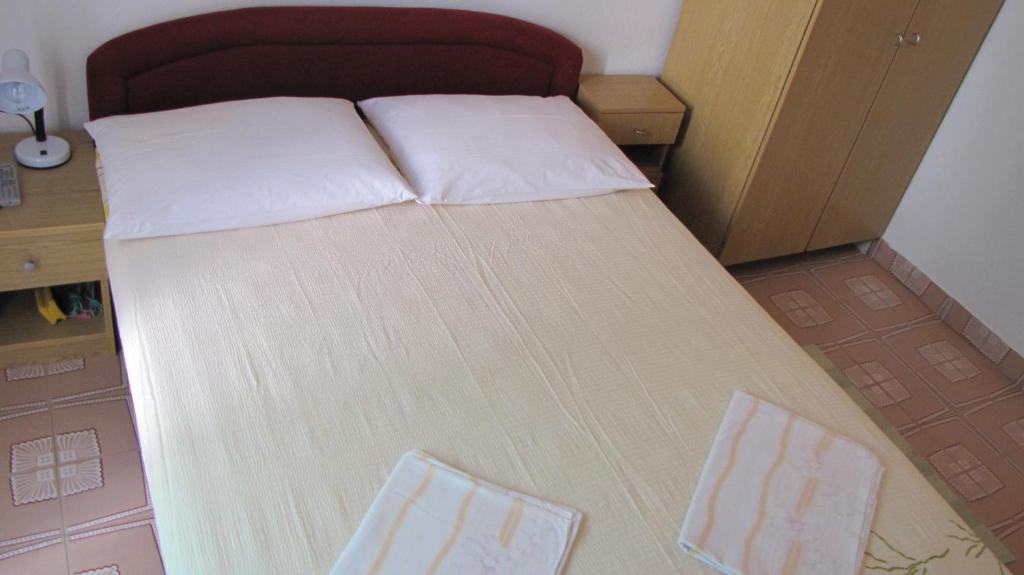 Postel nebo postele na pokoji v ubytování Apartments Primorac Podaca