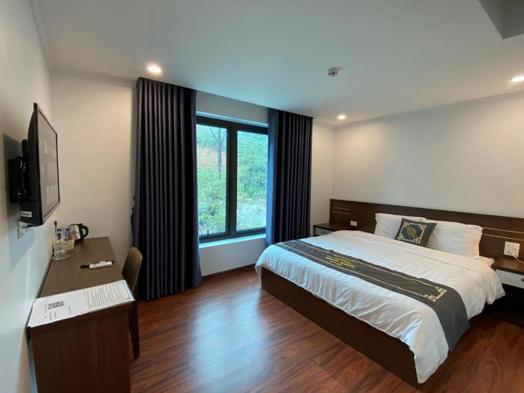 Giường trong phòng chung tại Apricot Garden Hotel Sapa