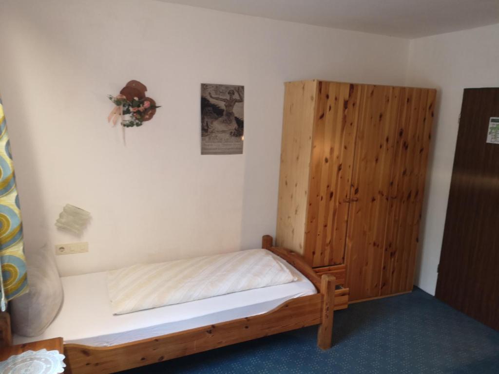 Postel nebo postele na pokoji v ubytování Hotel Finkenberg