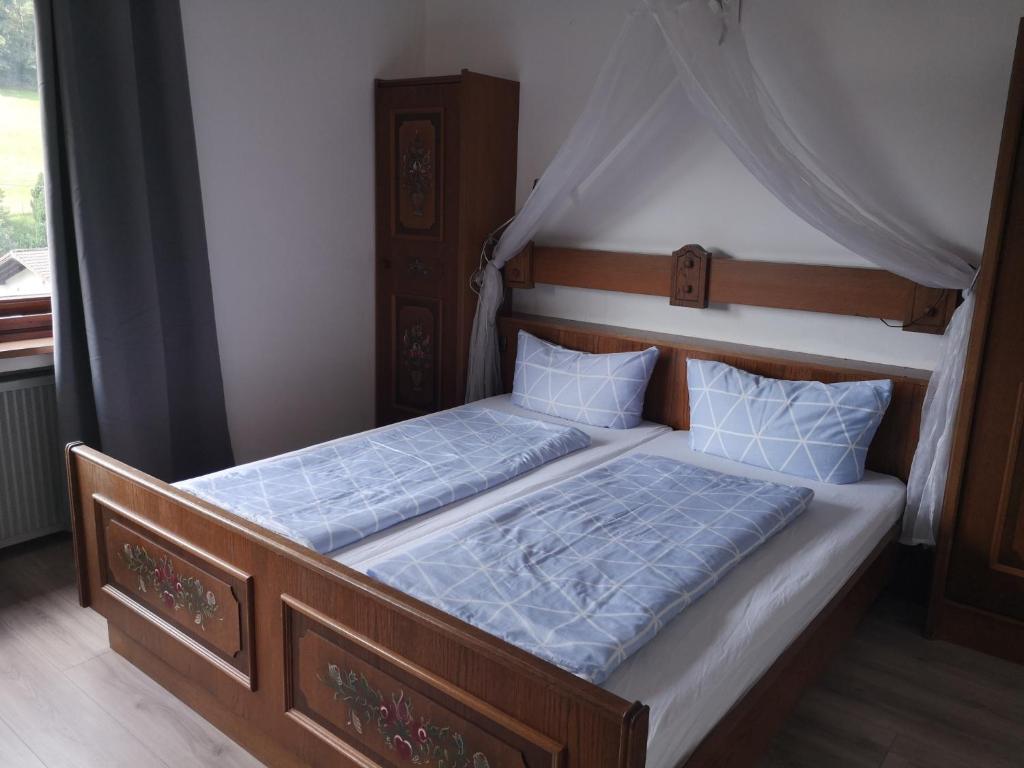Postel nebo postele na pokoji v ubytování Hotel Finkenberg
