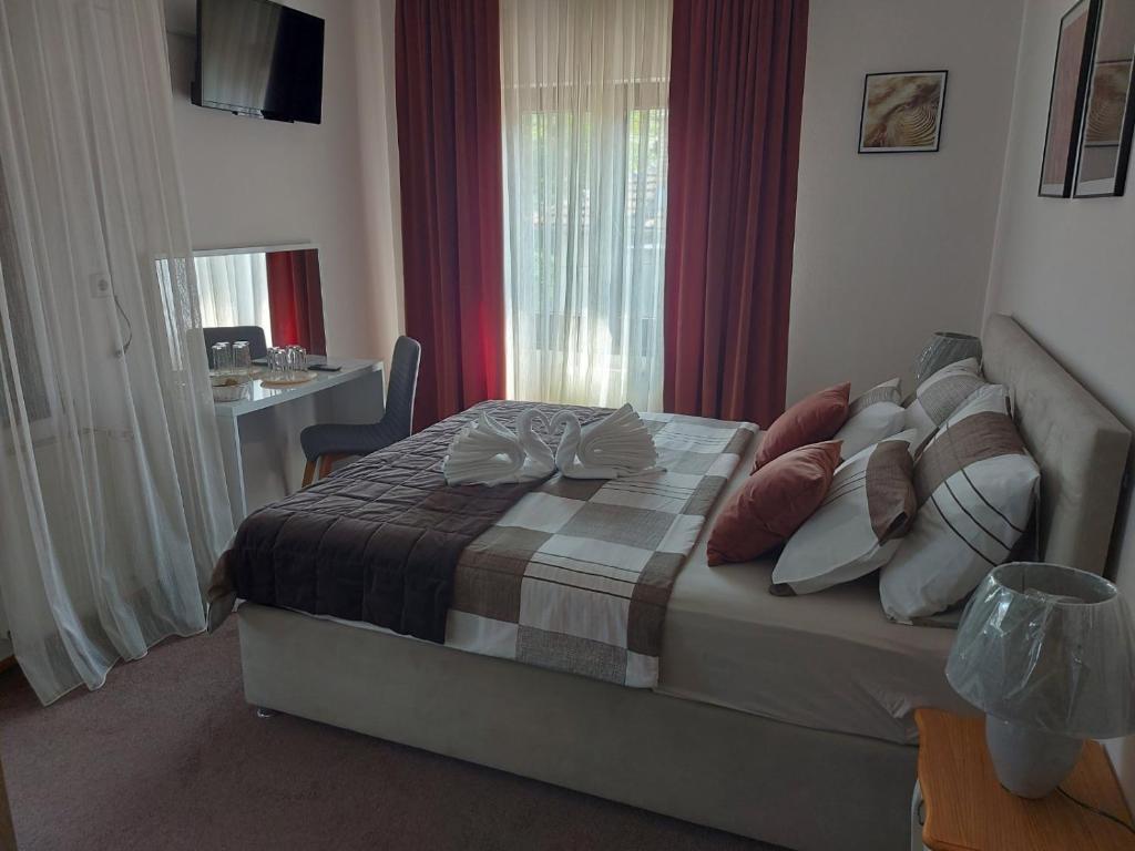 Postel nebo postele na pokoji v ubytování Bed & Breakfast Sjaj