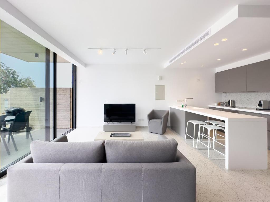 Kuchyň nebo kuchyňský kout v ubytování Sunset Park Villas